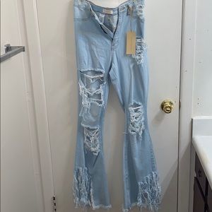Distressed light wash flare jeans